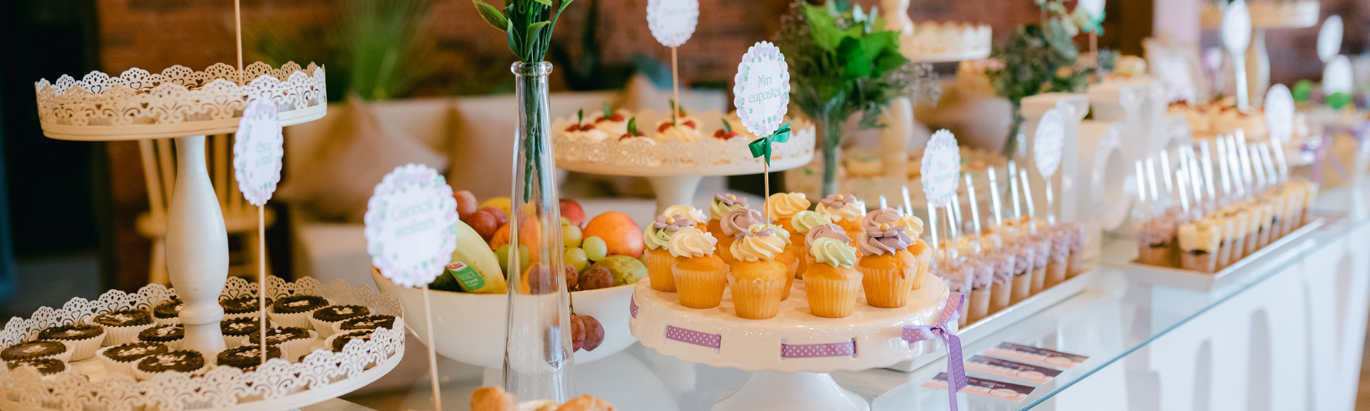  wedding receptioon dessert table with cake and treats