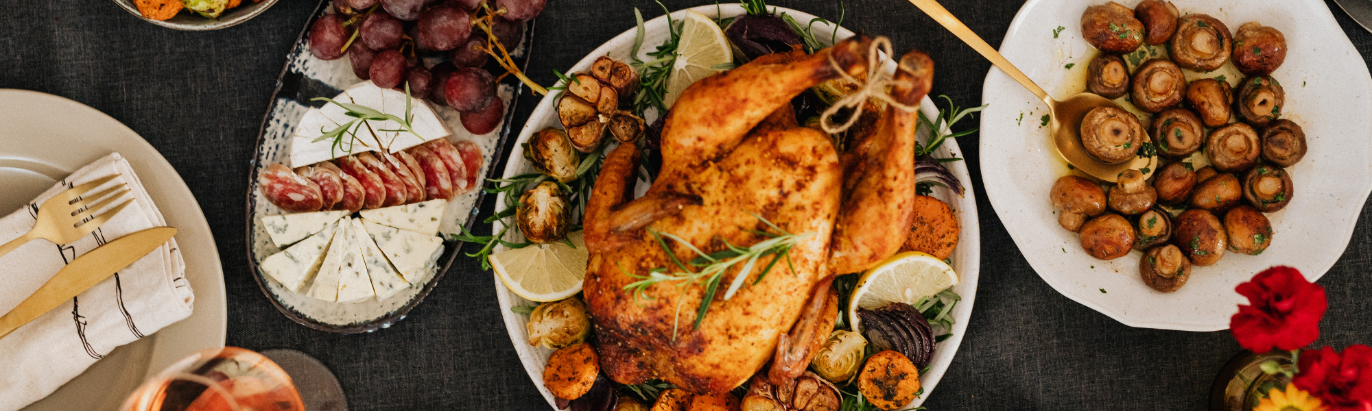 delicious whole roasted chicken with veggies on a table